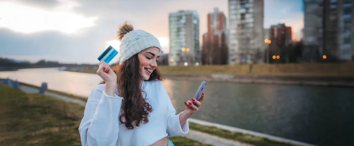 Woman holding credit card