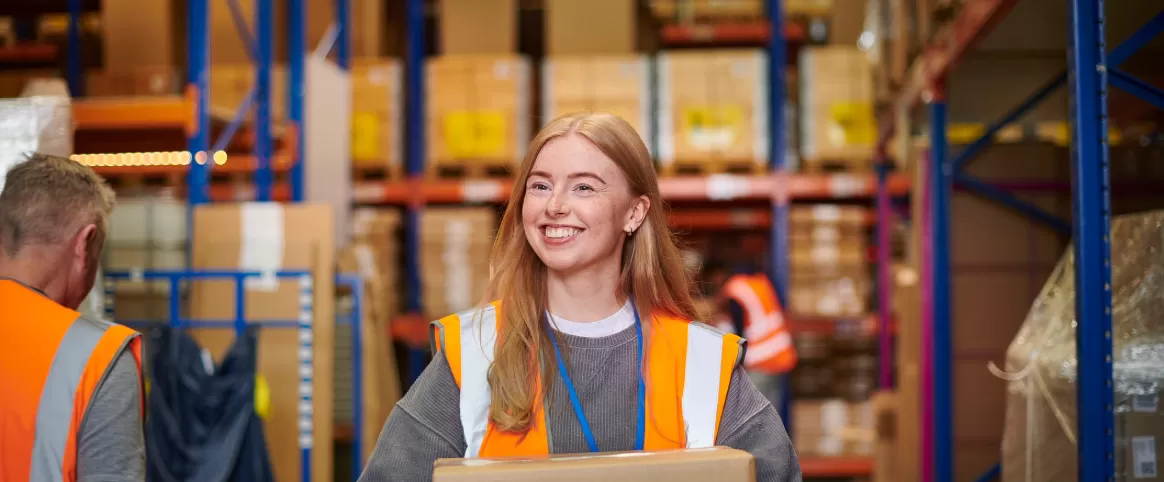 Happy young woman at work